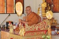 Buddhist monk is preaching to people. Royalty Free Stock Photo